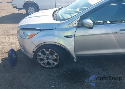 2015 Ford Escape Titanium z USA, uszkodzony, nr VIN 1FMCU0J98FUA15969